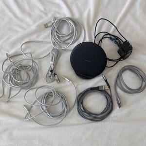 Bundle of charging cords including Samsung fast charger.